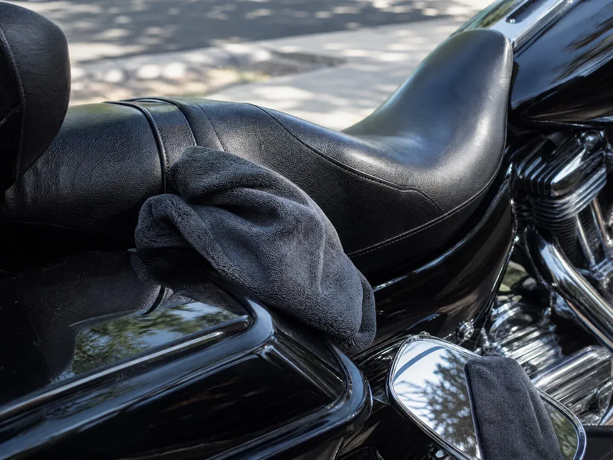 Motorcycle seat and leather detailing — Scarabbodyworks Detailing in Austin, TX