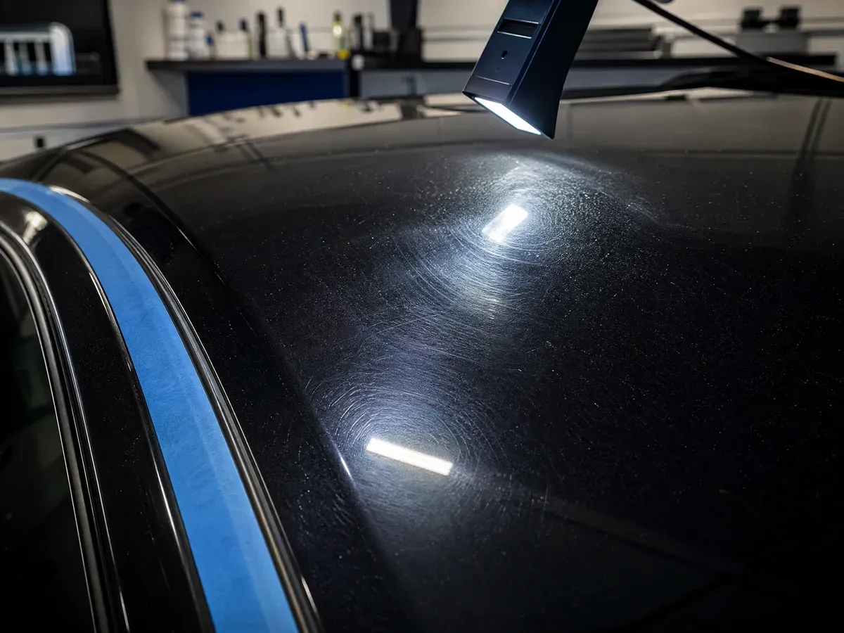 Paint inspection under raking light — Scarabbodyworks Detailing in Austin, TX